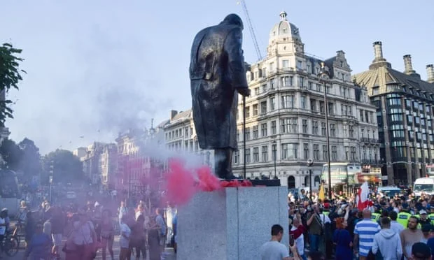 Smoke flares on the Churchill statue in Parliament Square, London