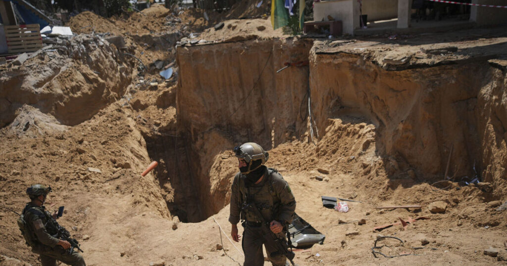 At least 12 killed by Israeli fire near aid points, Palestinians say