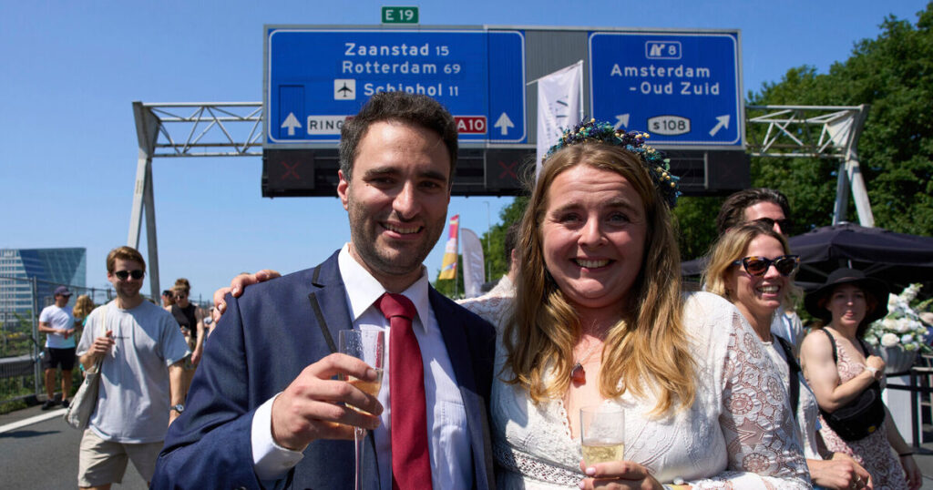 Couples tie the knot during a festival on an Amsterdam ring road