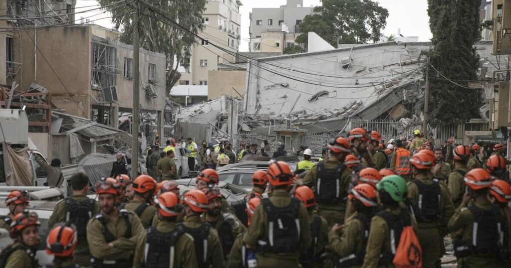 Iran renews missile attacks on Israel, killing five and wounding dozens