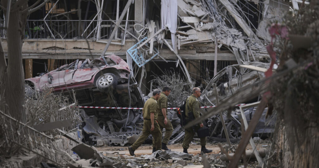 Israel warns 'Tehran will burn' after Iran launches deadly missile strikes