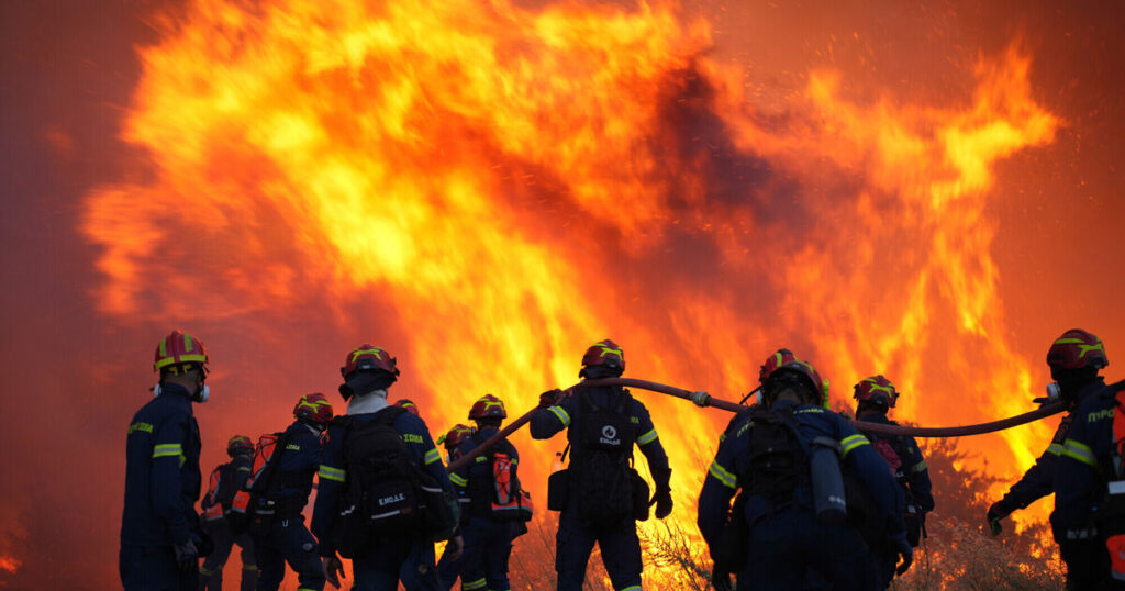 More than 100 firefighters battle large wildfire on Greek island
