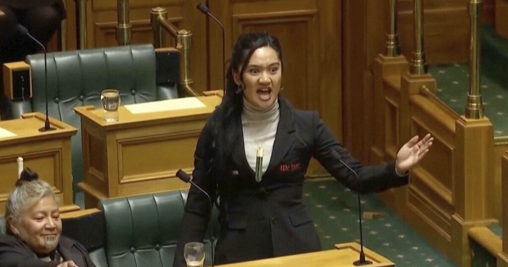 New Zealand parliament suspends three Maori Party politicians over haka protest