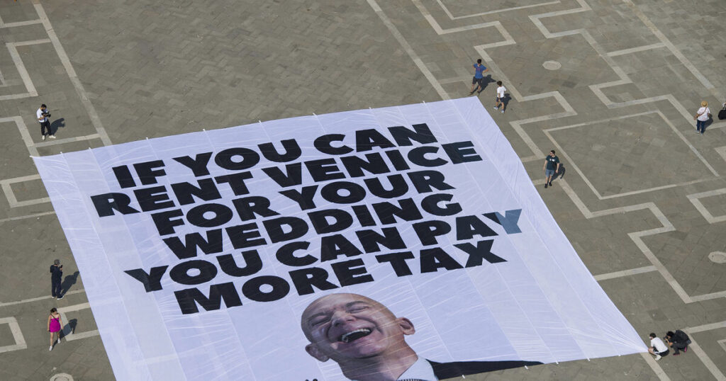 Protesters say Jeff Bezos’s Venice wedding highlights growing inequality