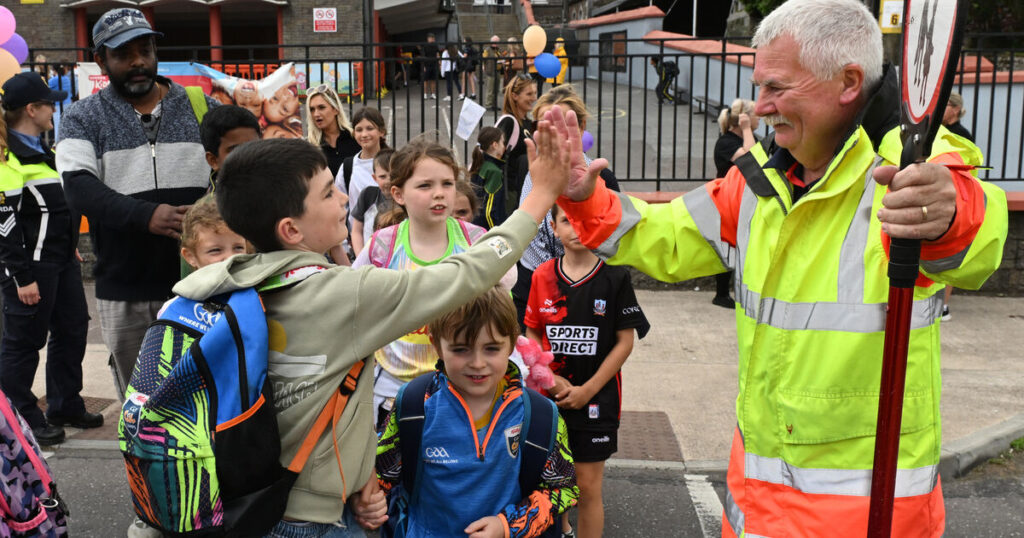 'You have to smile': Lollipop person of the year enjoys the craic with all his little charges
