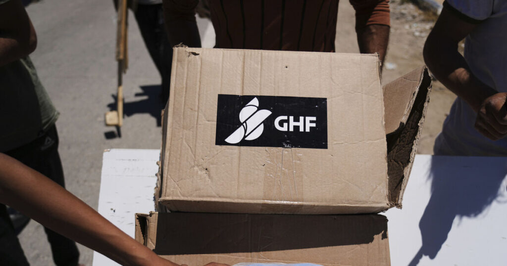 At least 20 Palestinians die in stampede at food distribution centre