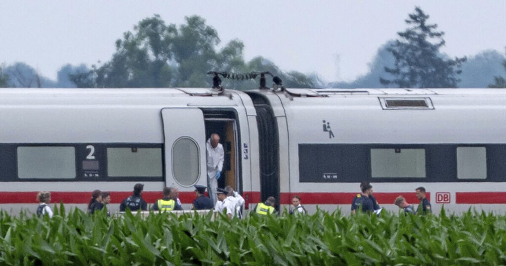 Four people injured in axe attack on German train, police say