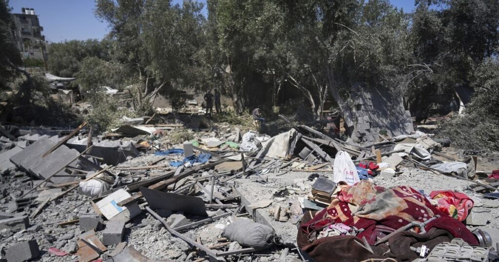 Six children among 10 people killed at water collection point by Israeli strike