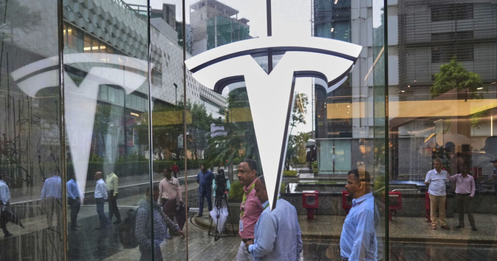 Tesla profit plunges in latest quarter as Musk’s turn to politics repels buyers