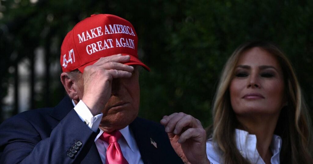 Trump supporters burn Maga hats after he dismisses Epstein files furor as ‘hoax’