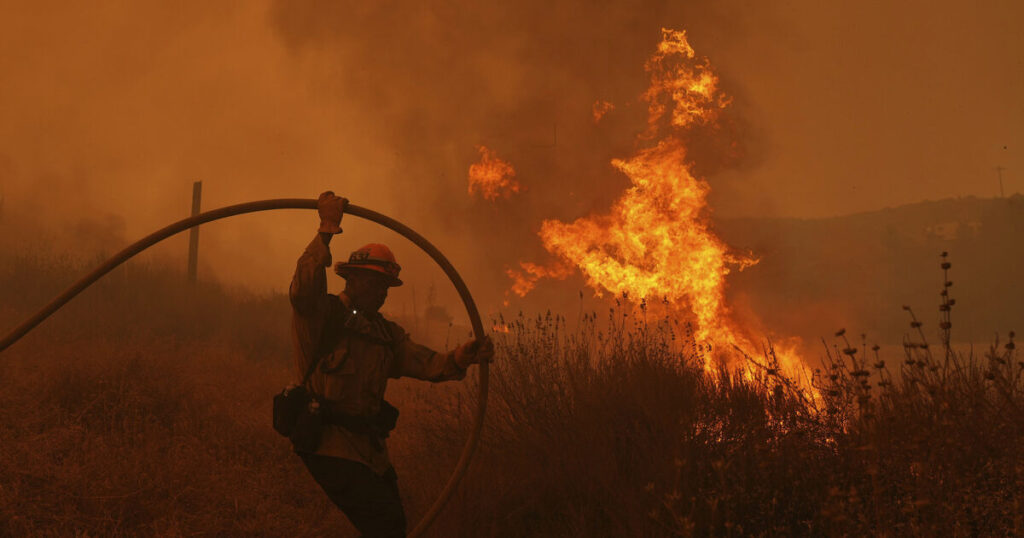 Fire crews make progress against blaze that forced thousands to flee north of LA